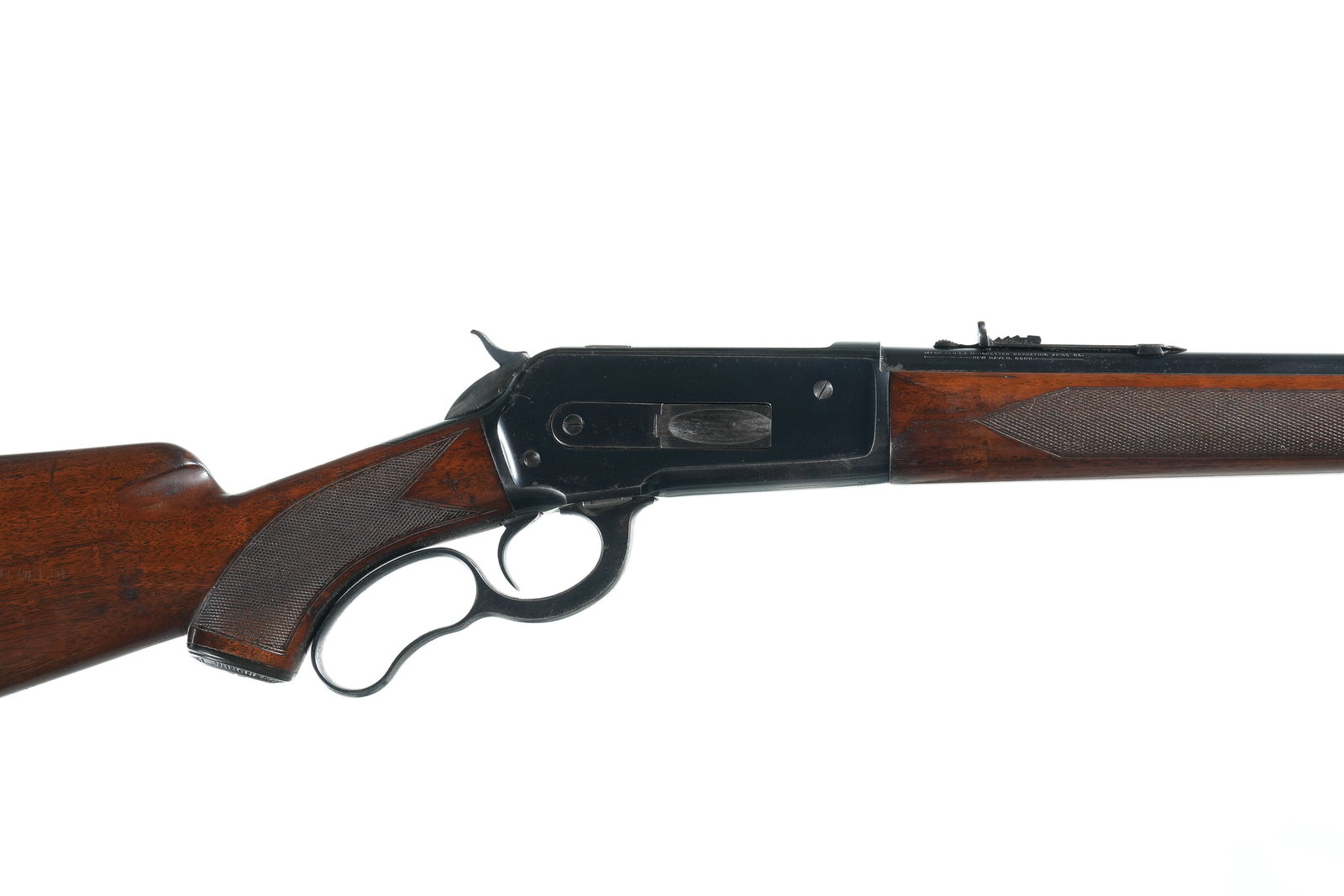 Winchester 71 Deluxe Lever Rifle .348 Win: .348 Win Serial # 16596 Winchester Model 71 Deluxe Pre-War Mfg 1939 with varnished checkered walnut stocks. Ramped sporting front sight with Winchester elevation adjustable rear sight. Period Ithaca r