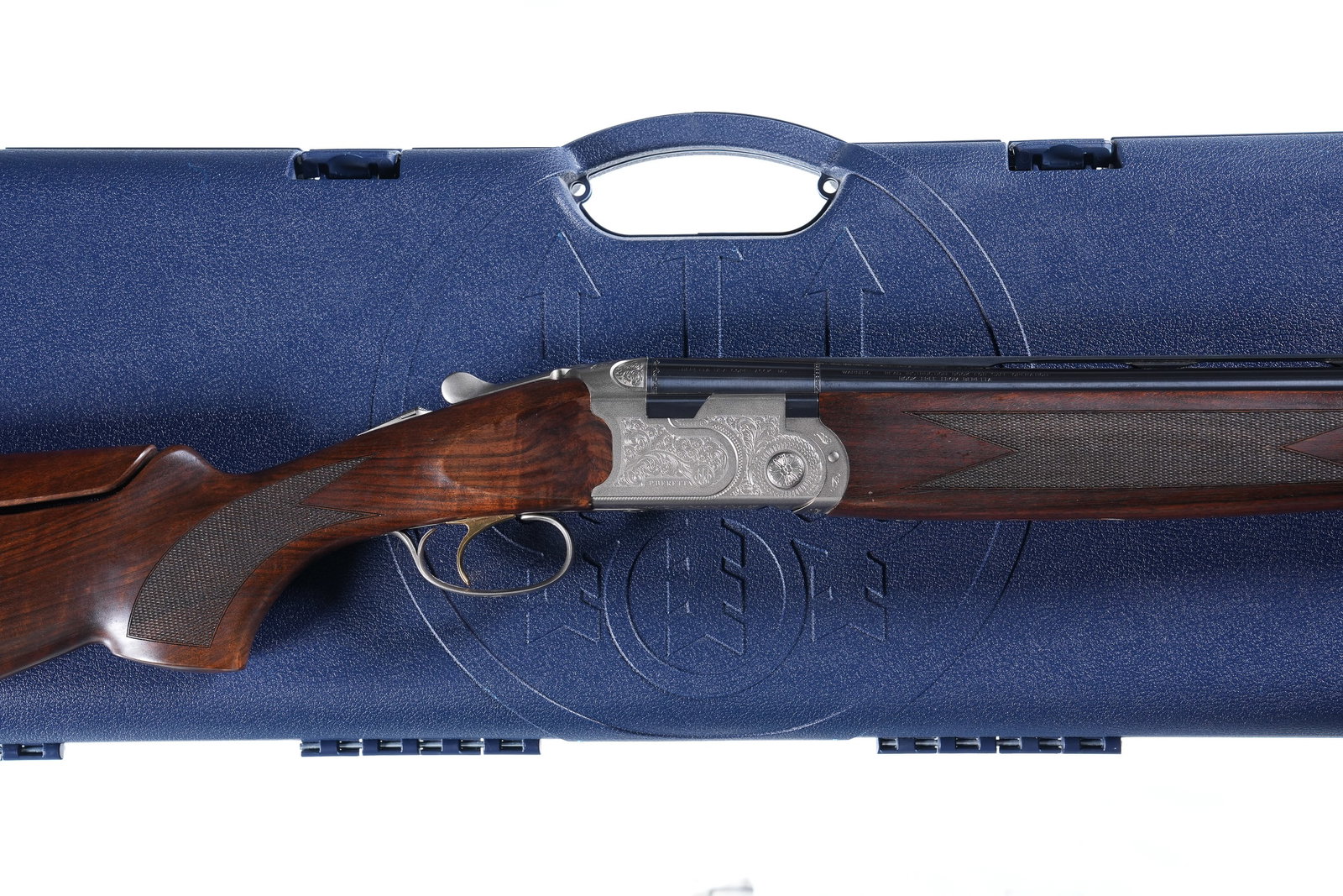 Beretta Silver Pigeon S O/U Shotgun 12ga: 12ga Serial # R51925S Beretta Model Silver Pigeon S 12 Ga with 30" vent rib Bbl, 3" chamber and interchangeable chokes. (5 included w/ wrench). Single selective trigger with ejectors. Engraved coin fi