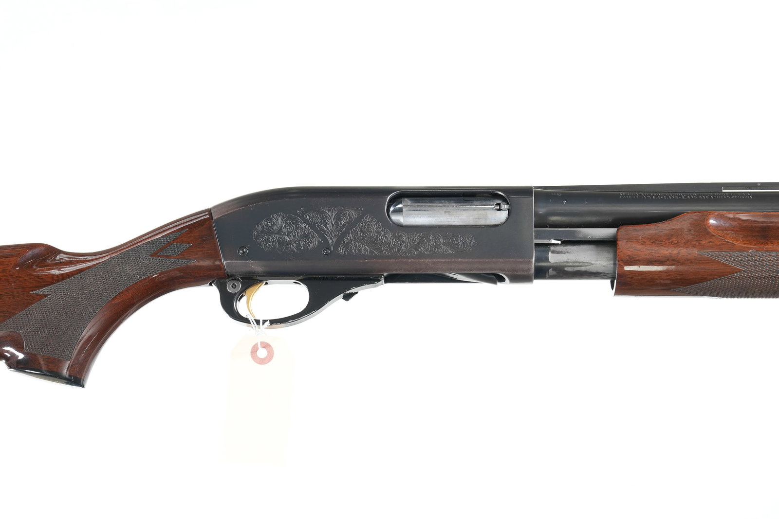 Remington 870 Wingmaster Slide Shotgun 12ga: 12ga Serial # D520504M Remington 12 Ga, 870 Wingmaster with factory scroll engraved receiver, blue finish, 26" vent rib Bbl, 2 3/4" chamber choked Imp, Cyl. Varnished checkered pistol grip walnut stoc