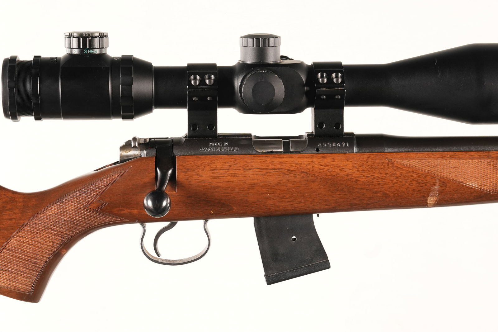 A2823 CZ 452-2E ZKM American Bolt Rifle .17 HMR: .17 HMR Serial # A558691 CZ 452 17 HMR with Hawke 4-16 power scope. 10 round detachable magazine. Threaded muzzle. Condition, Very fine with excellent bore and 97% finish. Stock is very good and optic