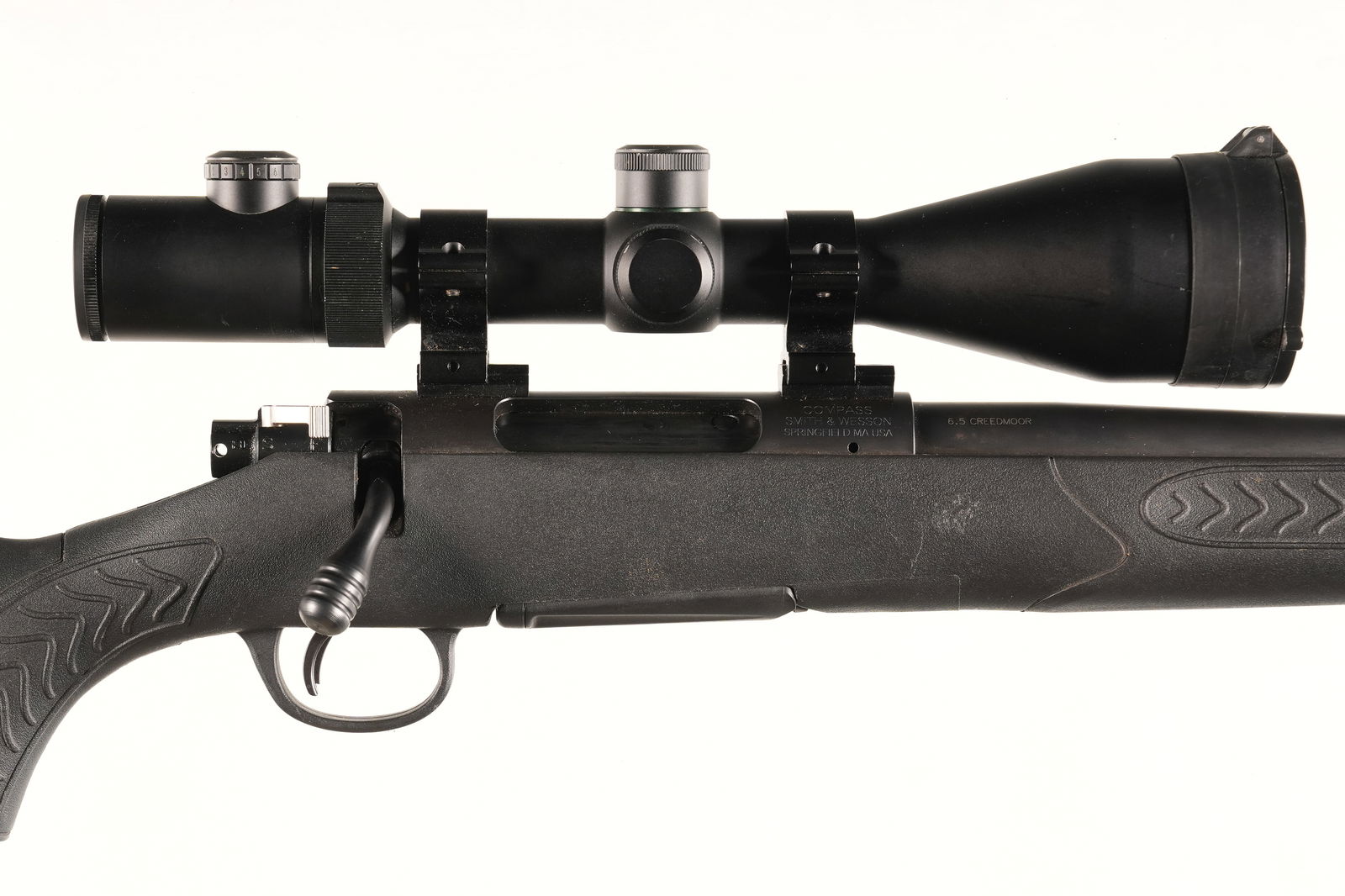 A3934 Thompson Center Compass II Bolt Rifle 6.5 Cr: 6.5 Creedmoor Serial # TJF7832 Smith & Wesson / Thompson Center Compass Bolt action rifle with detachable magazine, synthetic stock and chambered for 6.5 Creedmore. Mounted with Weaver 2.5-10 Variable