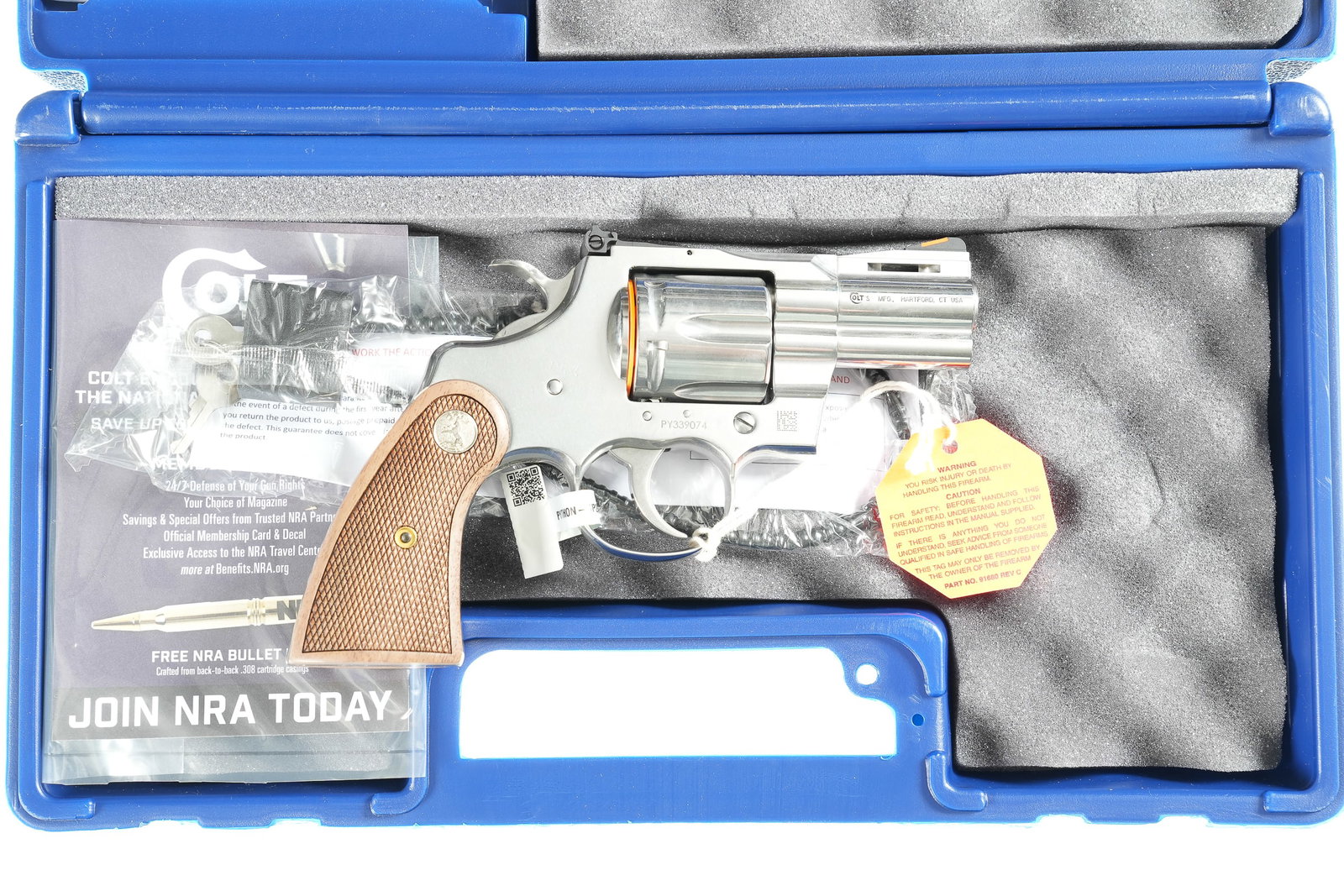 A3906 Colt Python Revolver .357 Mag: .357 Mag Serial # PY339074 Colt Python Stainless steel 2 1/2" Bbl, .357 Mag with checkered wood grips with Rampant Colt monograms. Comes in factory box with all paperwork. Condition, Appears unfired a