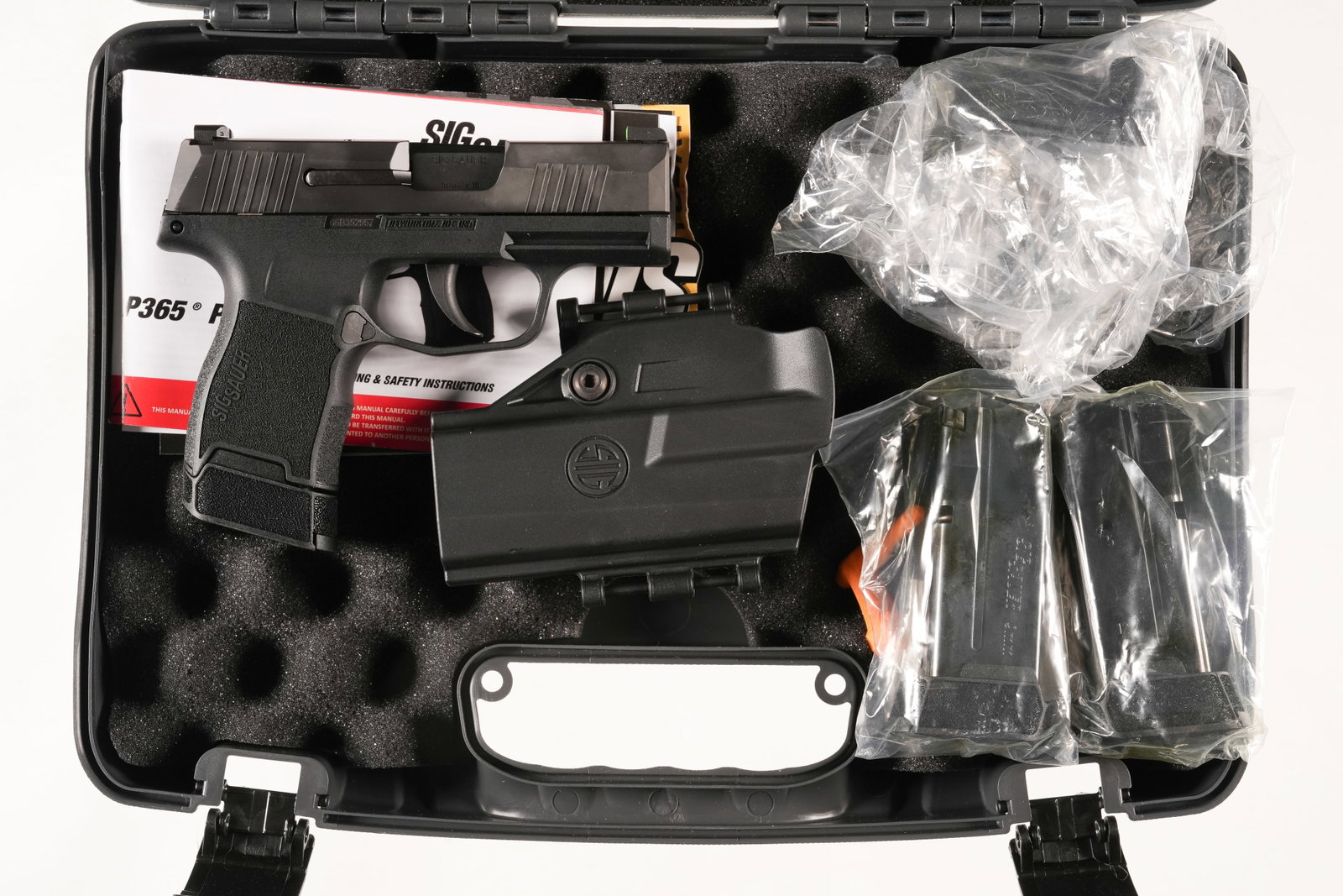 A4383 Sig Sauer P365 Pistol 9mm: 9mm Serial # 66B352957 Like new overall condition in factory box numbered to gun. Includes extra magazine, holster and attachments. Mechanically excellent. Barrel 3 1/4" Modern
