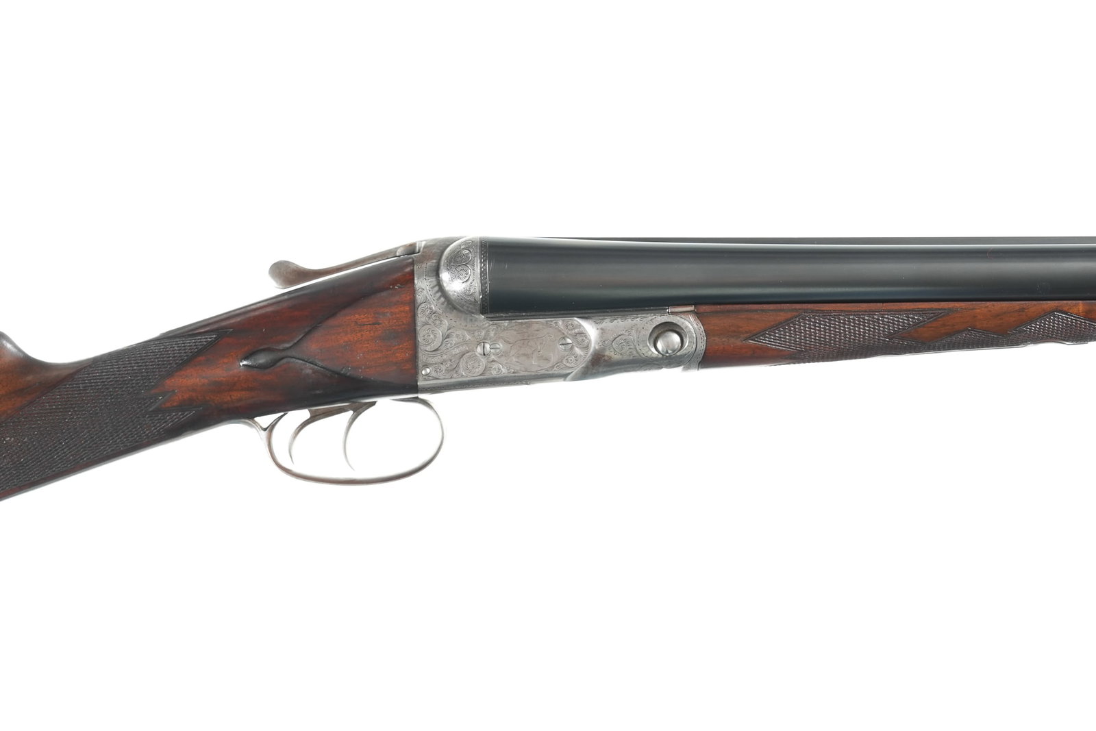 A4011 Parker Bros DHE SxS Shotgun 12ga: 12ga Serial # 199864 Parker Brothers DEHE 12 Ga with 32" Titanic steel Bbl's 2 5/8" chambers choked Mod & IC with 14 5/8" LOP over 1" pad. 1 3/8" DAC 2 1/2" DAH. Varnished straight chekered walnut sto