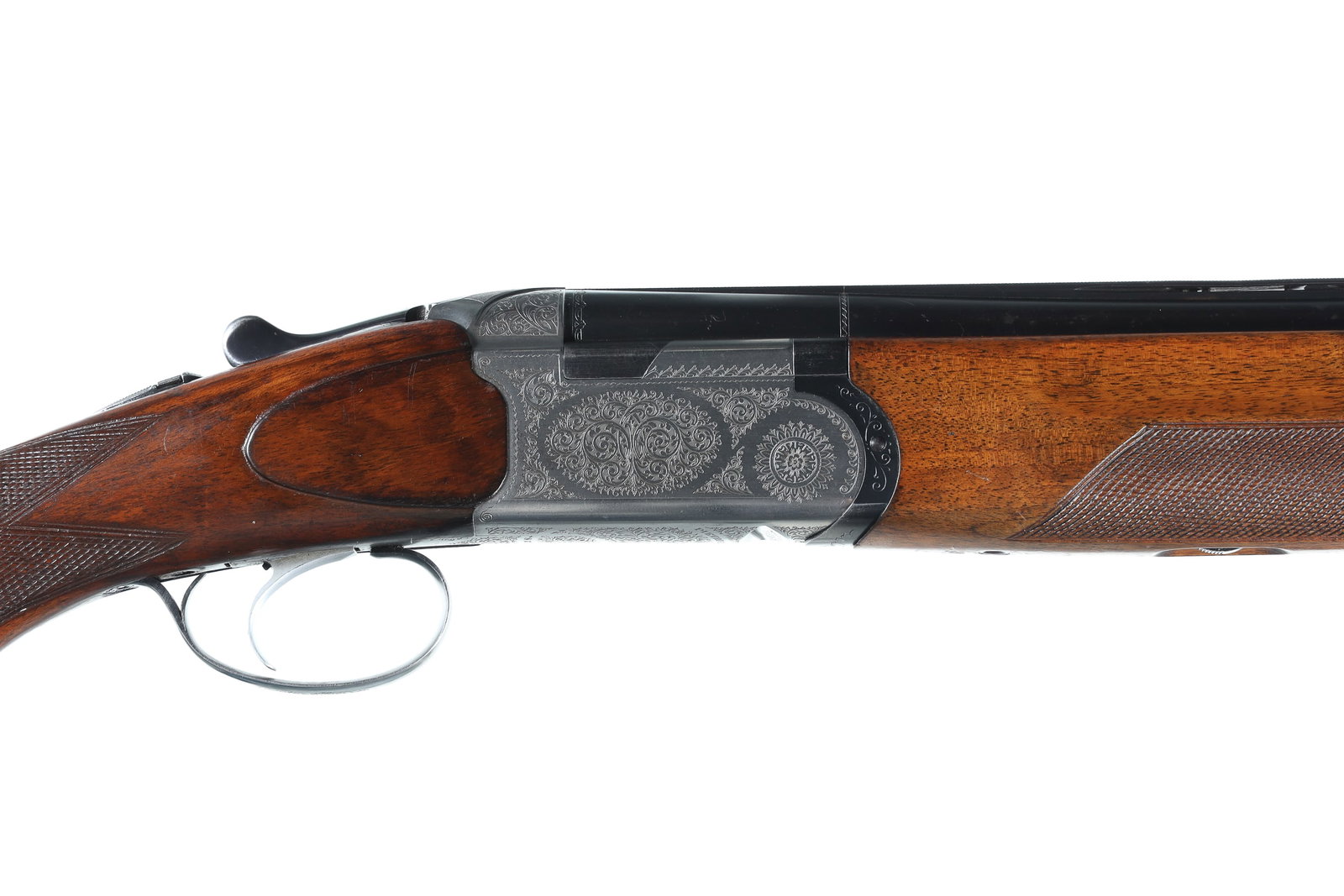 A313 Beretta 57E O/U Shotgun 12ga: 12ga Serial # B38899B P. Beretta Model S 57 E 12 Ga. over under 12 ga with 28" vent rib Bbl choked Mod & IC with 2 3/4" chambers. Coin finished scroll engraved receiver with single selective trigger. 