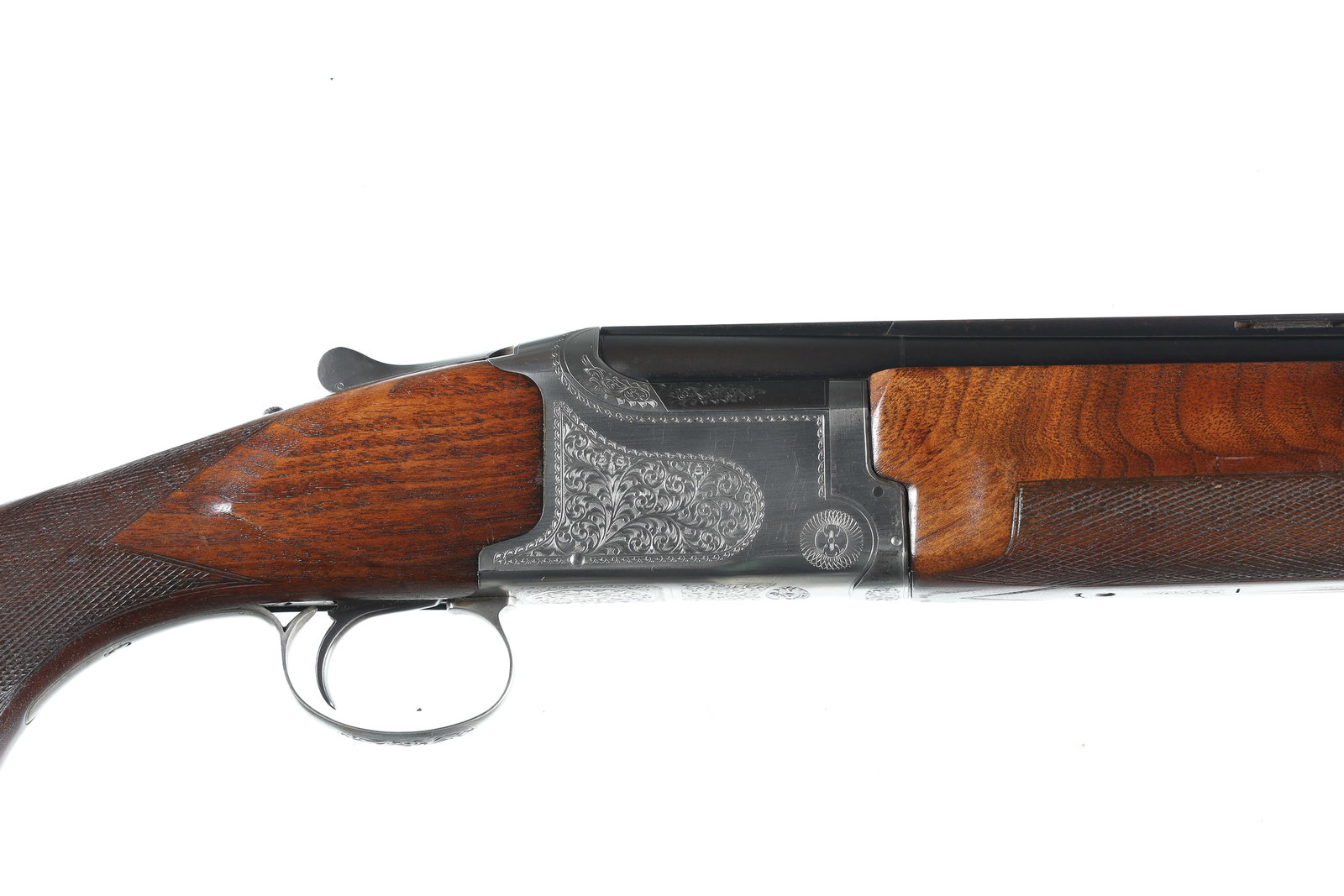 A424 Winchester Super Grade XTR O/U Shotgun 12ga: 12ga Serial # K452036 Winchester Super Grade 12 Ga over under with coin finished engraved receiver 30" Vent rib Bbl with 2 3/4" chambers and choked IM & IM with single selective trigger with ejectors.