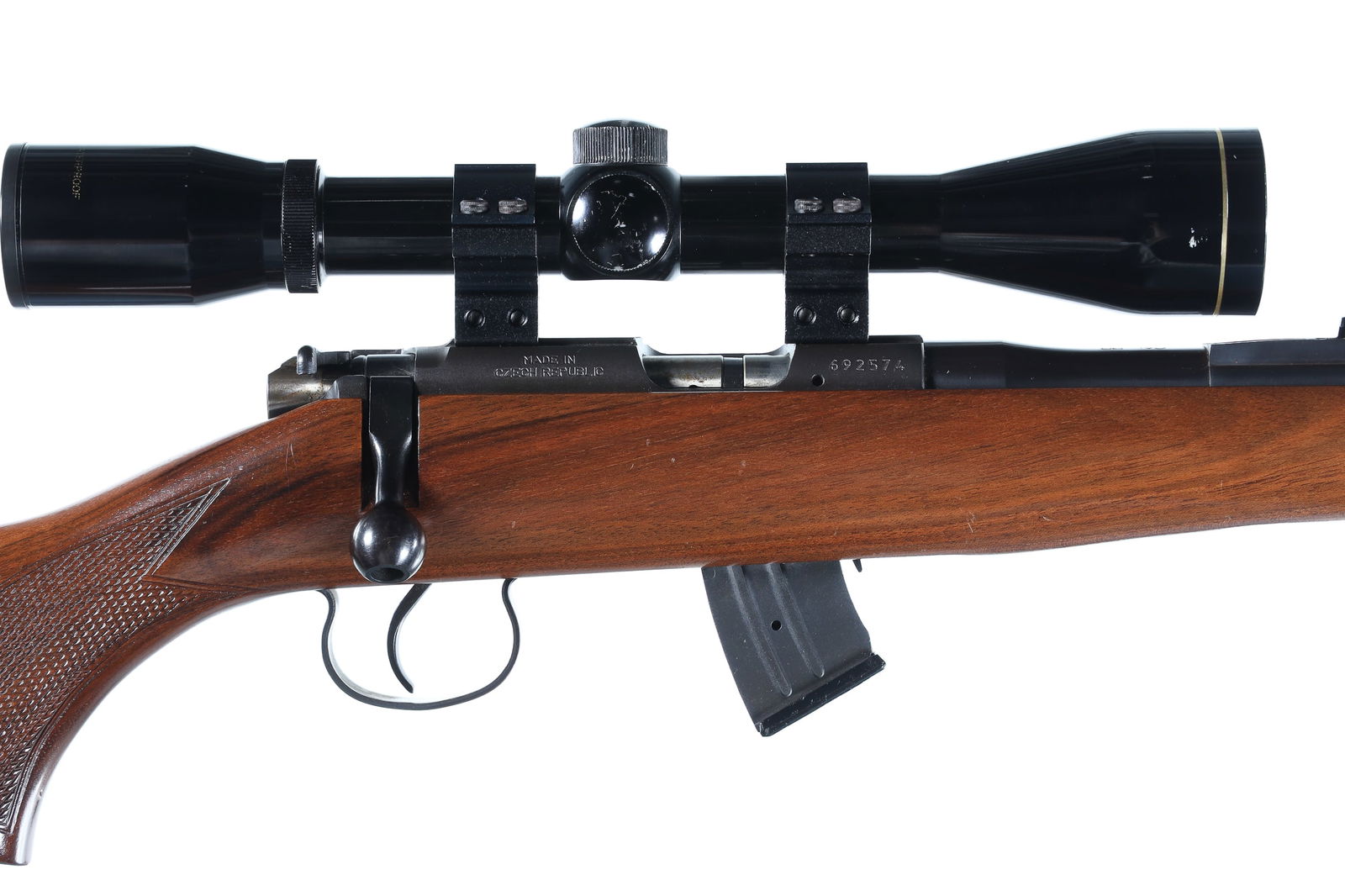 A284 CZ 452 Bolt Rifle .22 LR: .22 LR Serial # 692574 CZ 452 -2E .22 Long rifle bolt action with 10 round detachable magazine and varnished walnut stock with grooved receiver and mounted with Nikko 6 power scope. Condition. Very go