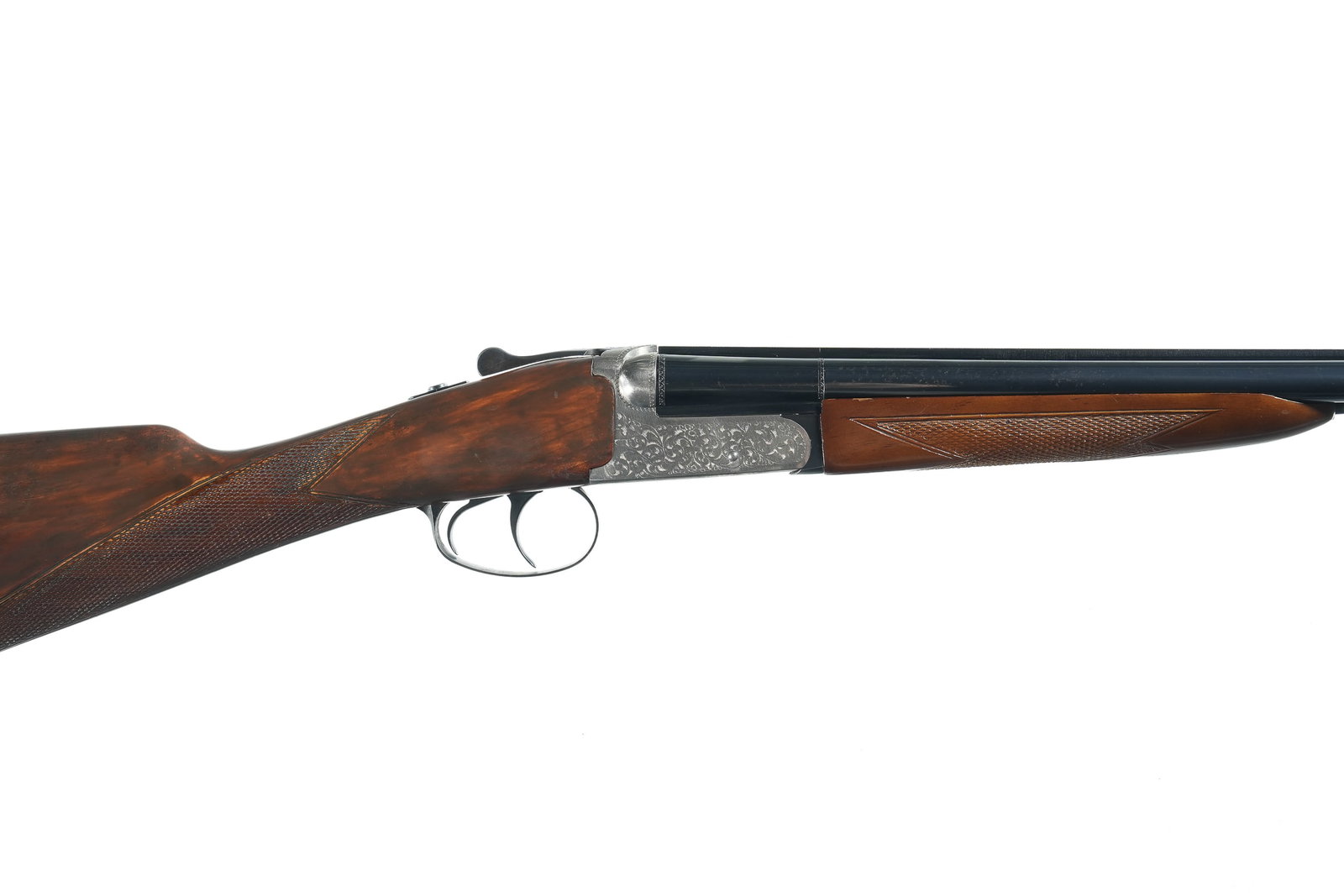 A1597 Zabala Boxlock SxS Shotgun 28 GA: 28 GA Serial # 60-03-2211 Zabala Scxroll engraved Box Lock 28 Ga, with double triggers and lifter extractors. Choked Full & Mod.14 3/4" LOP with 2 1/4" extension. Condition, Very fine with 98% finish 