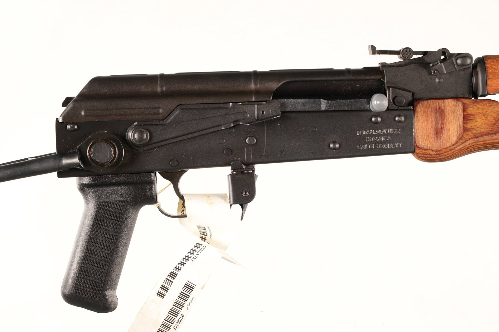 A4794 Romarm WASR-10 Semi Rifle 7.62x39mm: 7.62x39mm Serial # BT0598 Romanian WASR 10 Cugar Under folder AK platform rifle with slanted muzzle brake and adjustable sights. Stamped receiver with laminated forstock assembly. Accepts high capacit