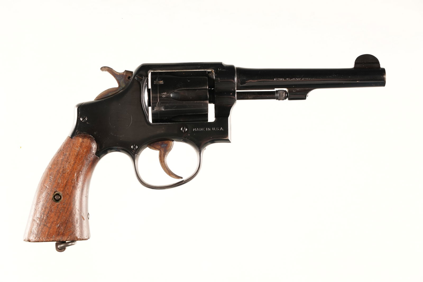 A4926 Smith & Wesson Victory Revolver .38 S&W: .38 S&W Serial # 612521 Smith & Wesson Lend Lease Victory Model with British proofs and 5" Bbl cal. 38 S&W with smooth walnut grips. Condition, Good as heavily refinished with bright bore and mechanic