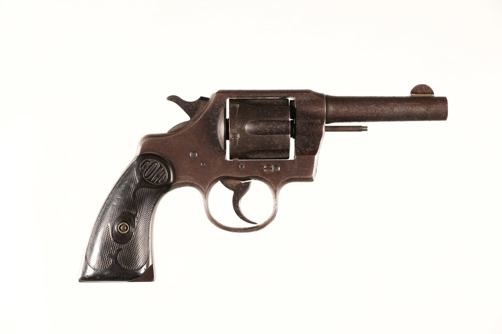 A4885 Colt Army Revolver .38 spl: .38 spl Serial # 331902 Colt Army Special .38 Spl, revolver Mfd, 1911 with Colt plastic grips. Condition, Fair with oxidized exterior , dark bore and loose lock up. Grips have minor chip at toe. Eject