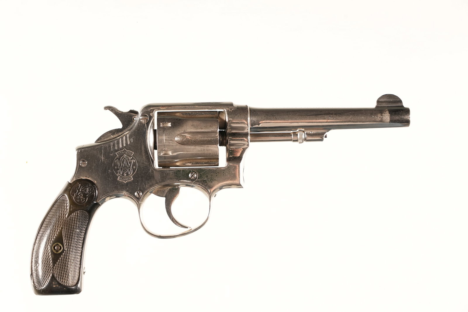 A4924 Smith & Wesson Hand Ejector Revolver .32-20: .32-20 WCF Serial # 32721 Smith & Wesson 32-20 Hand Ejector with 5" Bbl, Nickel finish with Rubber S&W grips. Condition, Good as refinished with strong bore with roughness in grooves. Mechanically fin