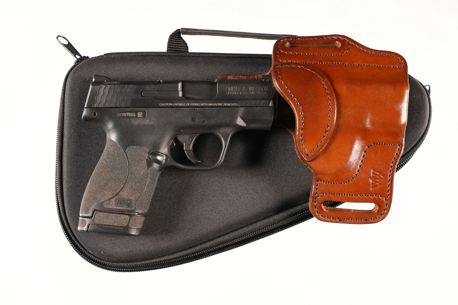 A4729 Smith & Wesson M&P Shield 2.0 Pistol .40 S&W: .40 S&W Serial # HYN7544 with leather holster and Allen soft case modern