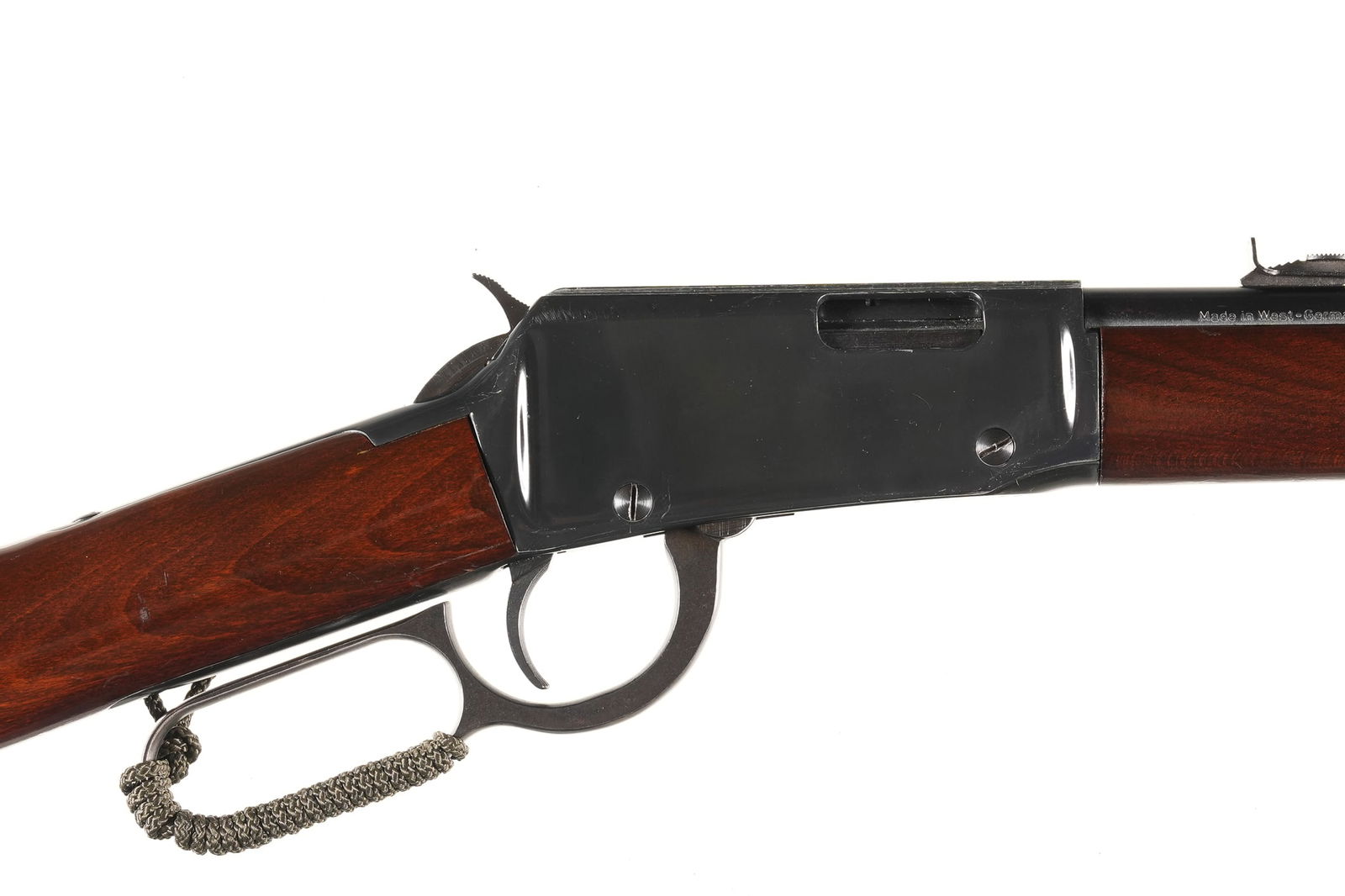 A4482 ERMA EG712 Lever Rifle .22 LR: .22 LR Serial # 60317 Erma EG712 22 LR lever action with tube magazine and grooved receiver. Walnut stocks with 13" LOP. . Condition very good with bright bore. Replaced butt plate and scrubbed magazi