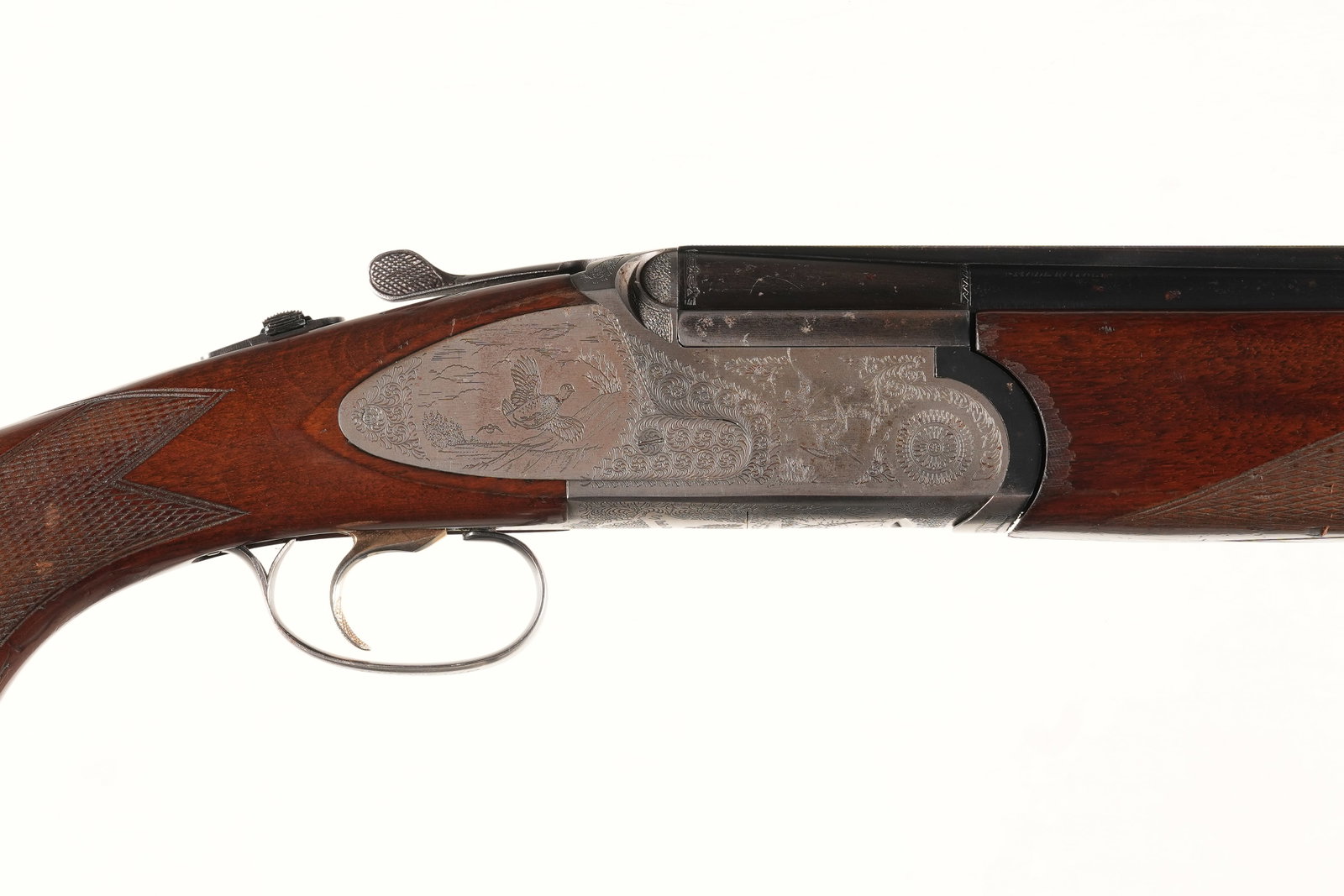 A2685 Rizzini Sideplate O/U Shotgun 12ga: 12ga Serial # 77092 Rizzini 12 ga side plated 12 Ga over under single selective trigger with ejectors. 28" Vent rib Bbl with Mod & Full chokes. Condition fair with cracked forearm. Butt stock has brui