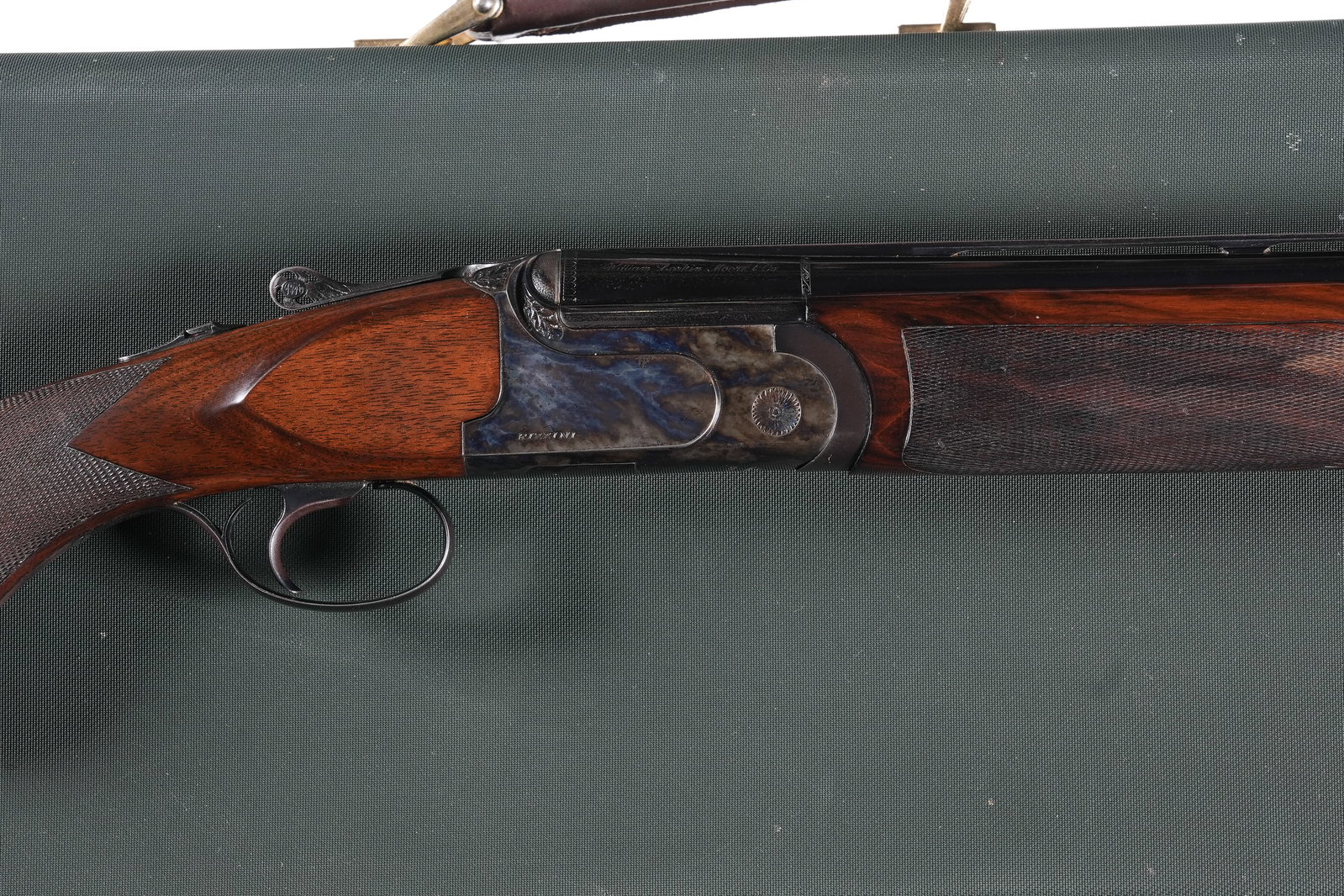 Rizzini Upland EL O/U Shotgun 20ga: 20ga Serial # 31480 Rizzini 20 Ga Upland EL over under shotgun with 28" vent rib Bbl, 3" Chamber with interchangeable chokes (4 total). Case colored receiver with single selective trigger and ejectors