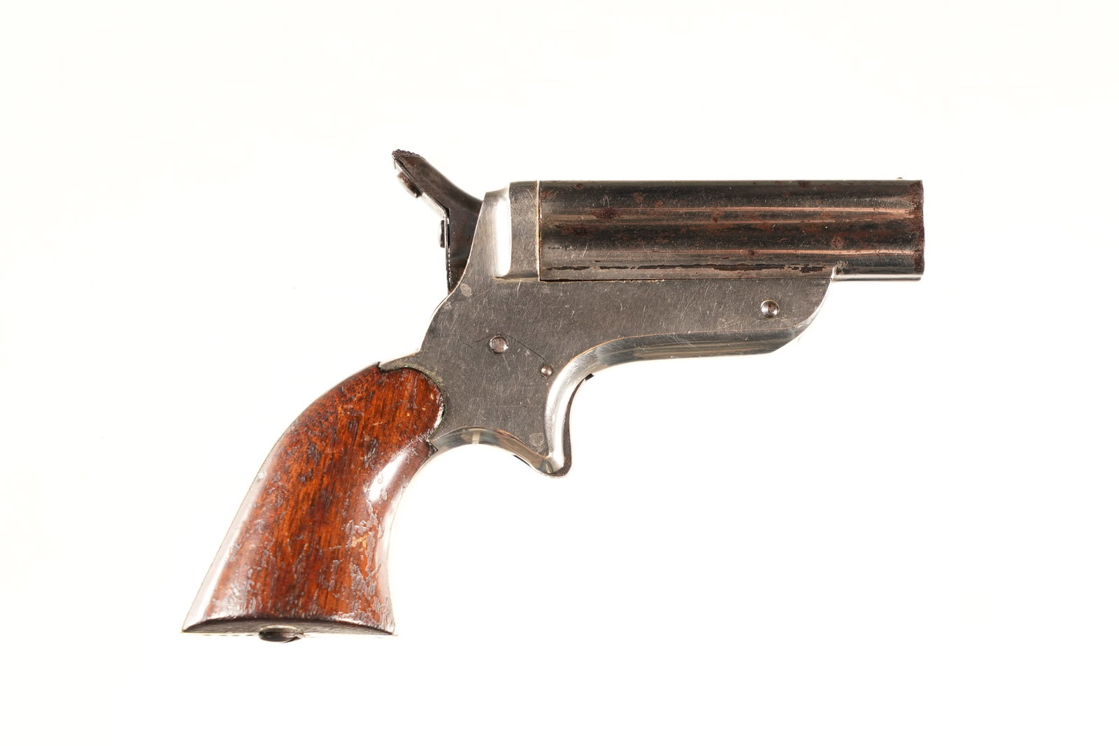 Sharps 1B Pepperbox Pistol .22 rf: .22 rf Serial # 2299 Sharps 1B Pepperbox 22 RF cal with 4 barrel cluster Nickel finish with varnished rosewood grips. Condition, very fine with most all nickel remaining. Mechanically fine Barrel 2 1/