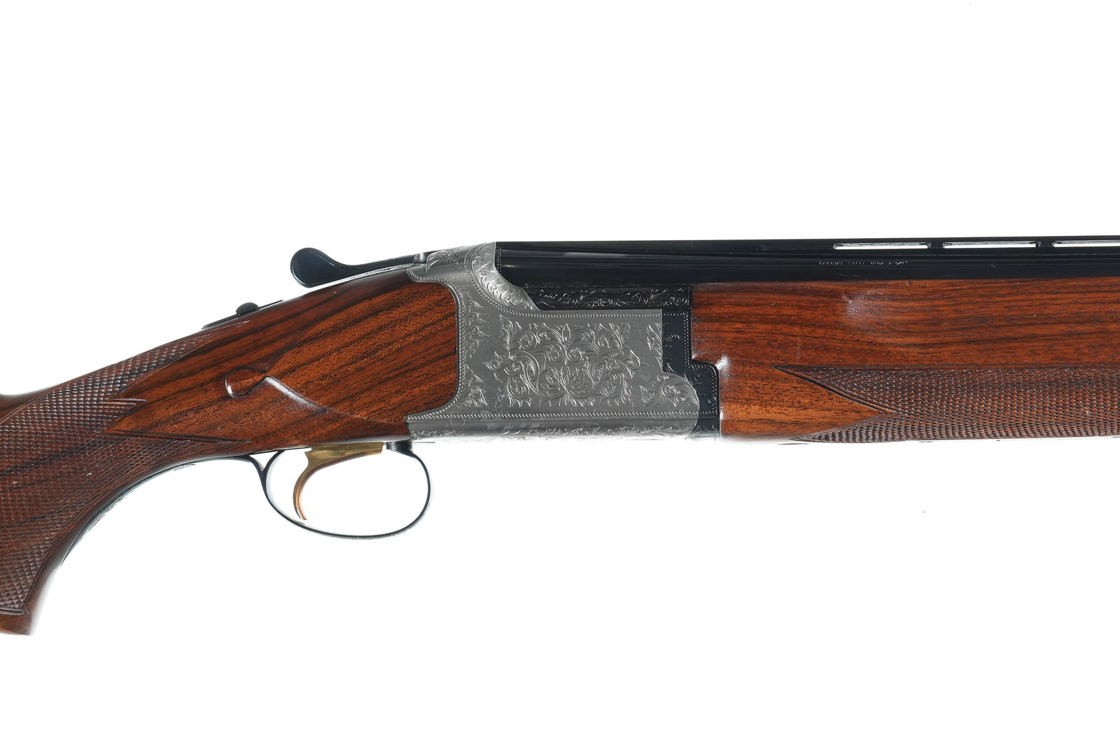 Miroku Sporter O/U Shotgun 12ga: 12ga Serial # 3380383 B.C. Miroku 12 Ga over under with single selective trigger and ejectors. 26" Vent rib Bbl choke Mod & Mod. Varnished walnut checkered pistol grip stock with 14 1/4" LOP. scroll &