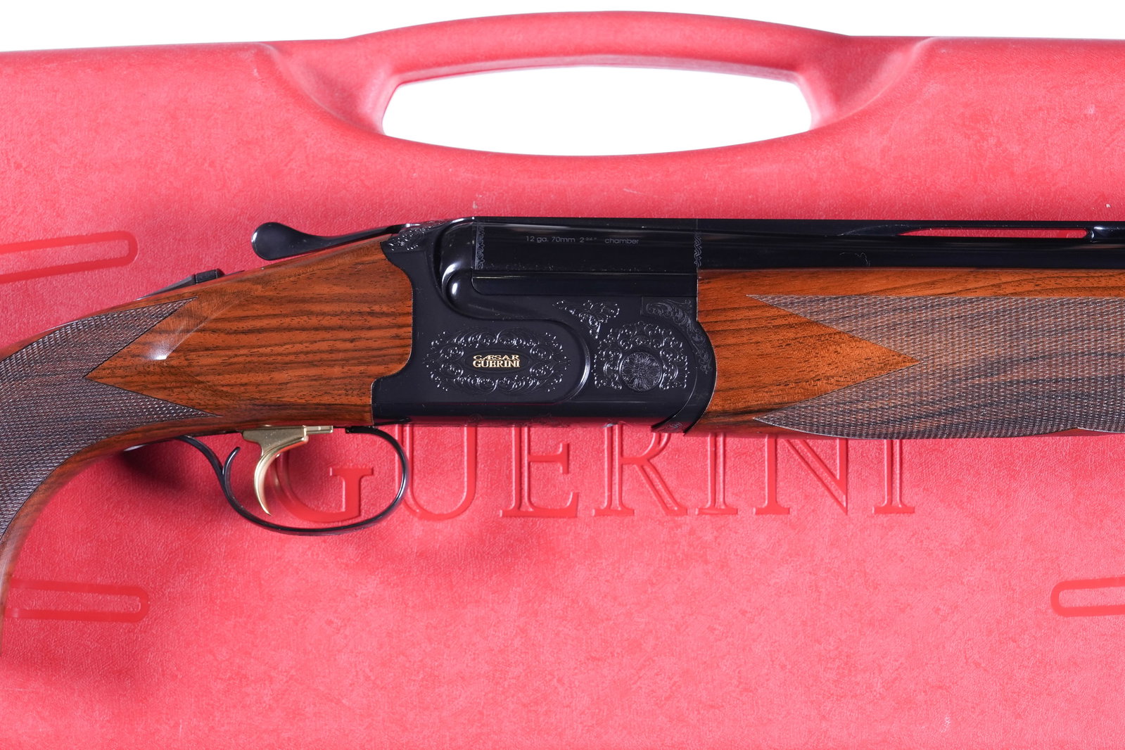 Caesar Guerini Summit O/U Shotgun 12ga: 12ga Serial # 151955 Caesar Guerini Summit 12 Ga over under with 30" vent rib Bbl, 2 2/3" chamber, single selective adjustable trigger with ejectors. Interchangeable Maxis Extended competition choke s