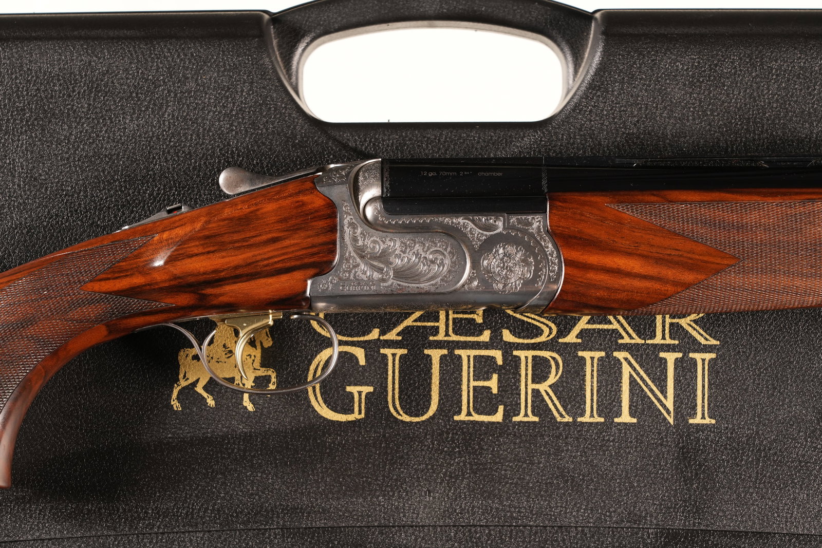 Caesar Guerini Challenger O/U Shotgun 12 GA: 12 GA Serial # 127865 Caesar Guerini Challenger 12 Ga over under with wide competition vent rib, 2 3/4" chambers with ejectors. Single selective adjustable trigger. Coin finished receiver is artfully 
