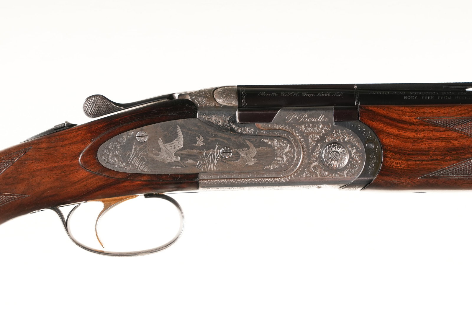 Beretta 687 EELL O/U Shotgun 20ga: 20ga Serial # M60500B Beretta Model 687 EELL 20 Ga 3" chambers with single selective trigger and ejectors. Choked Mod & IC with game scene engraved side plated box lock action and gold accented trigge