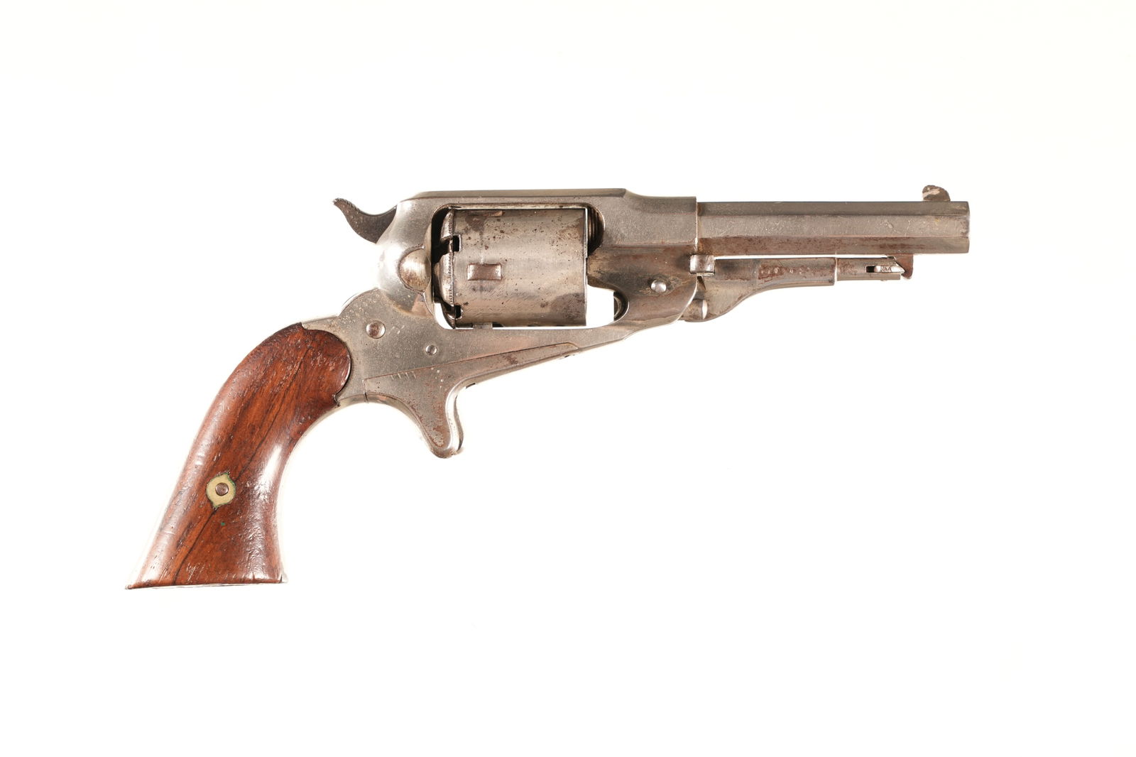 Remington New Model Revolver .31 cal: .31 cal Serial # 222116 Remington New Model .32 RF Cartridge Conversion revolver with 3 1/2" octagon Bbl, Nickel finish with 2 piece Rose Wood grips. Condition, Very fine with 90% nickel finish Mechan