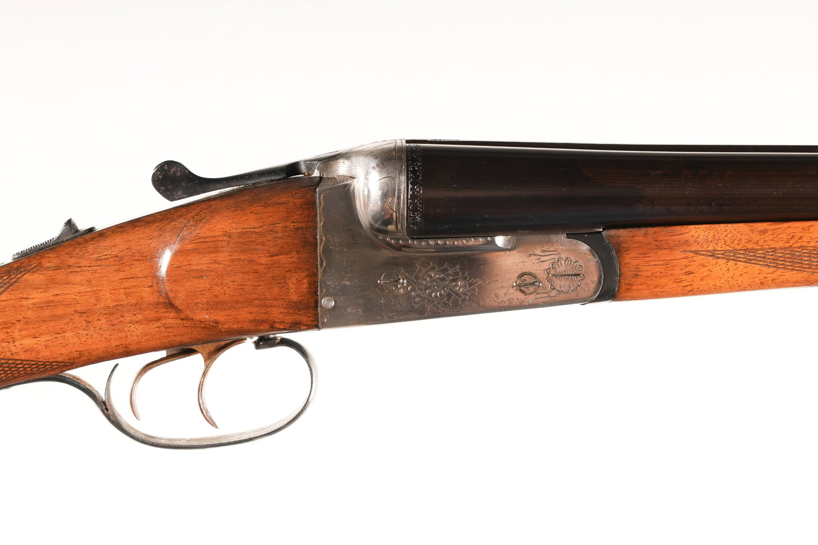Davidson 63B SxS Shotgun 12ga: 12ga Serial # LI46334 Davidson's Firearms Model 63B 12 Ga double with lifter extractors 2 3/4"' chambers double triggers and choked Mod & IC with 14" LOP. Condition, Very fine as partially refinished 