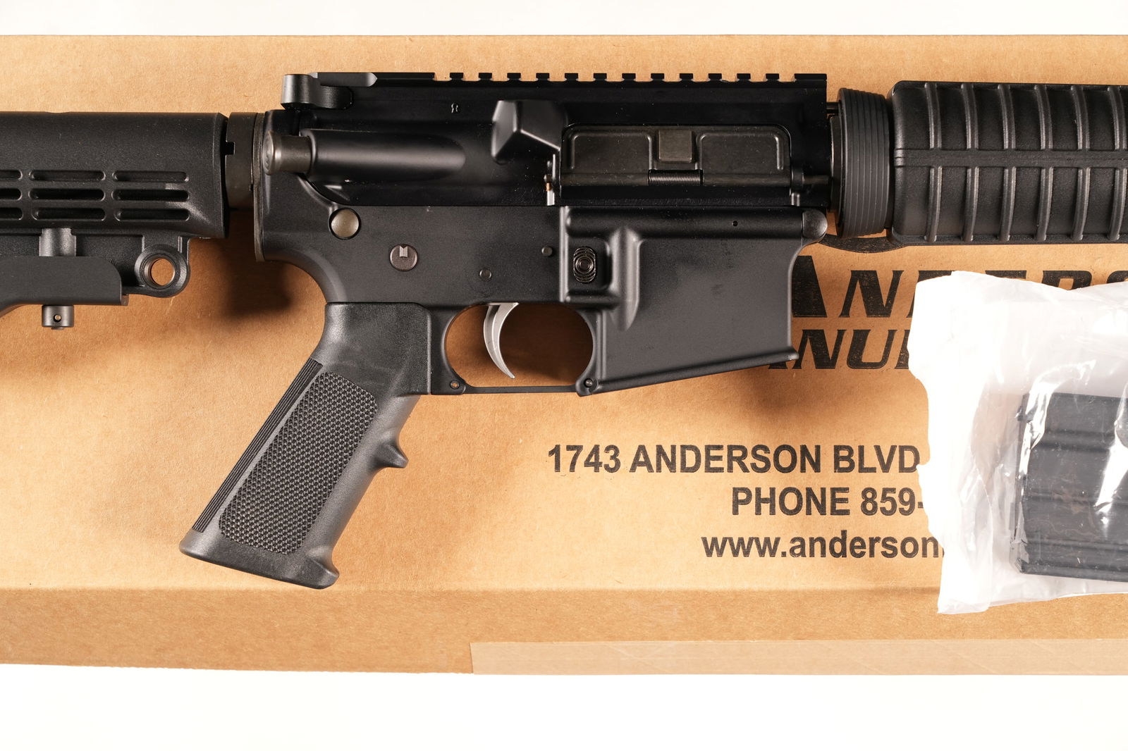 Anderson AM-15 Semi Rifle 5.56: 5.56 Serial # 21415912 Anderson AM-15 AR Platform rifle with collapsible stock , M4 pattern 16" Bbl with 1-8 twist. Flat top upper with factory box numbered to gun. Condition, Excellent with little or