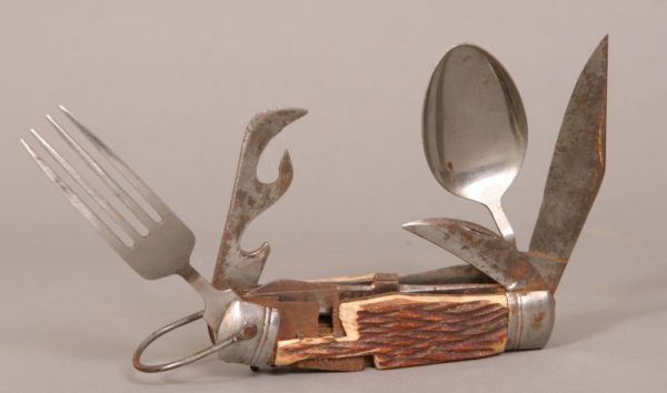 Pocket Swiss Army/Boy Scout-style knife: Pocket Swiss Army/Boy Scout-style knife with knives, fork, spoon, bottle opener, scissors, corkscrew; marking appears to be MH Suboshi; bone handle is chipped on both sides Live auction by Montrose Au