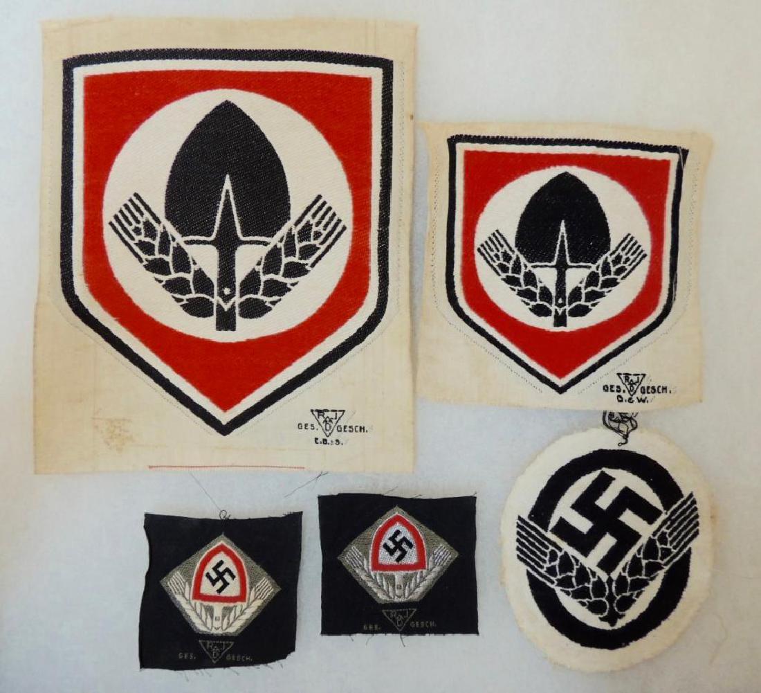 Group of 4 WW2 German RAD Cap and Shirt Insignia's (1 of 1)