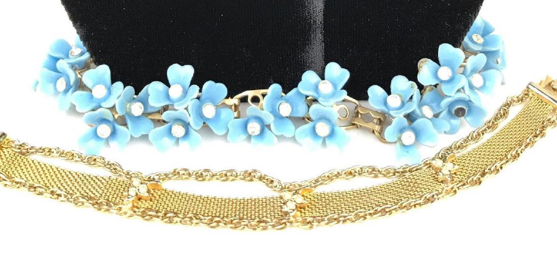 Pair of Blue and Gold Bracelets: Blue bracelet is 7" and missing a stone; gold bracelet is 7-1/4" and signed Goldette