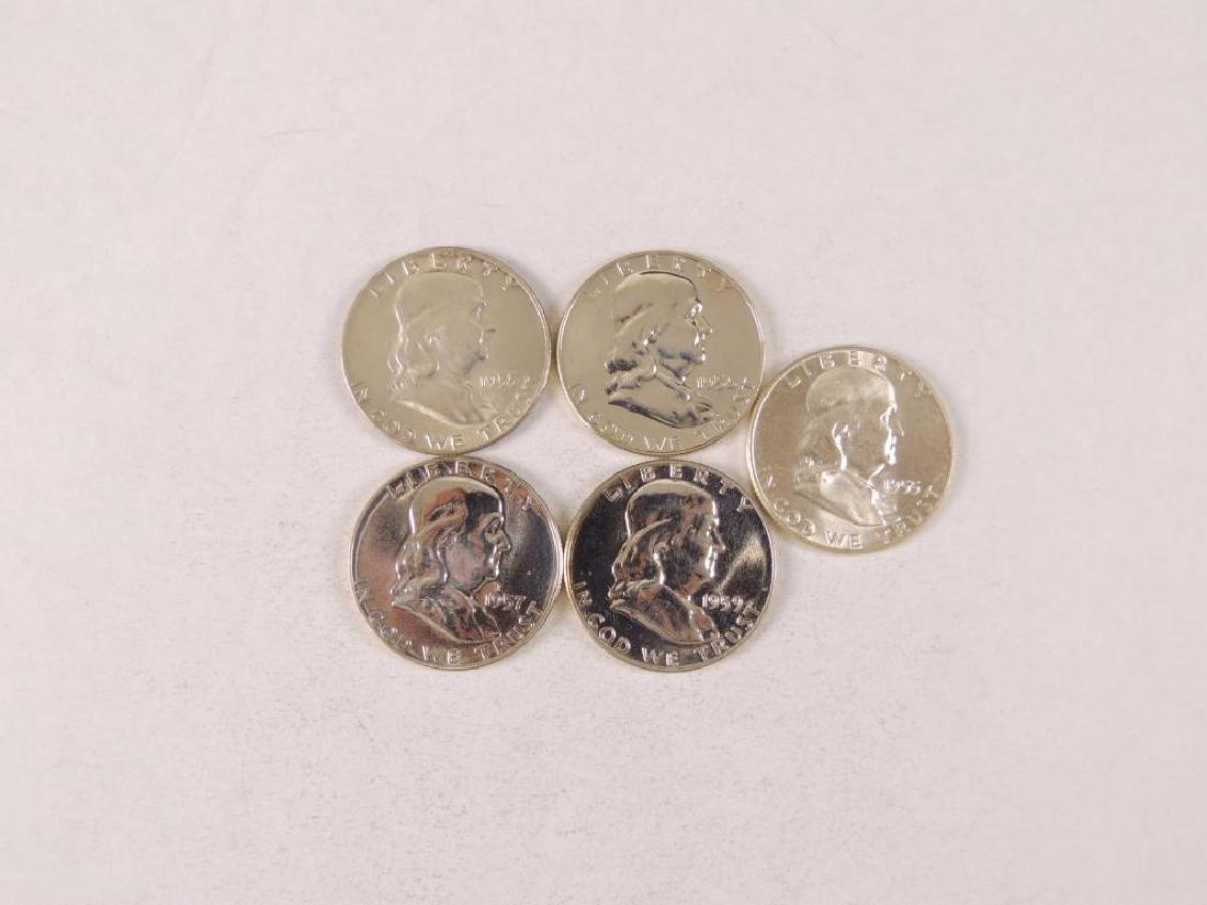 Group of five Franklin silver half-dollars (1 of 1)