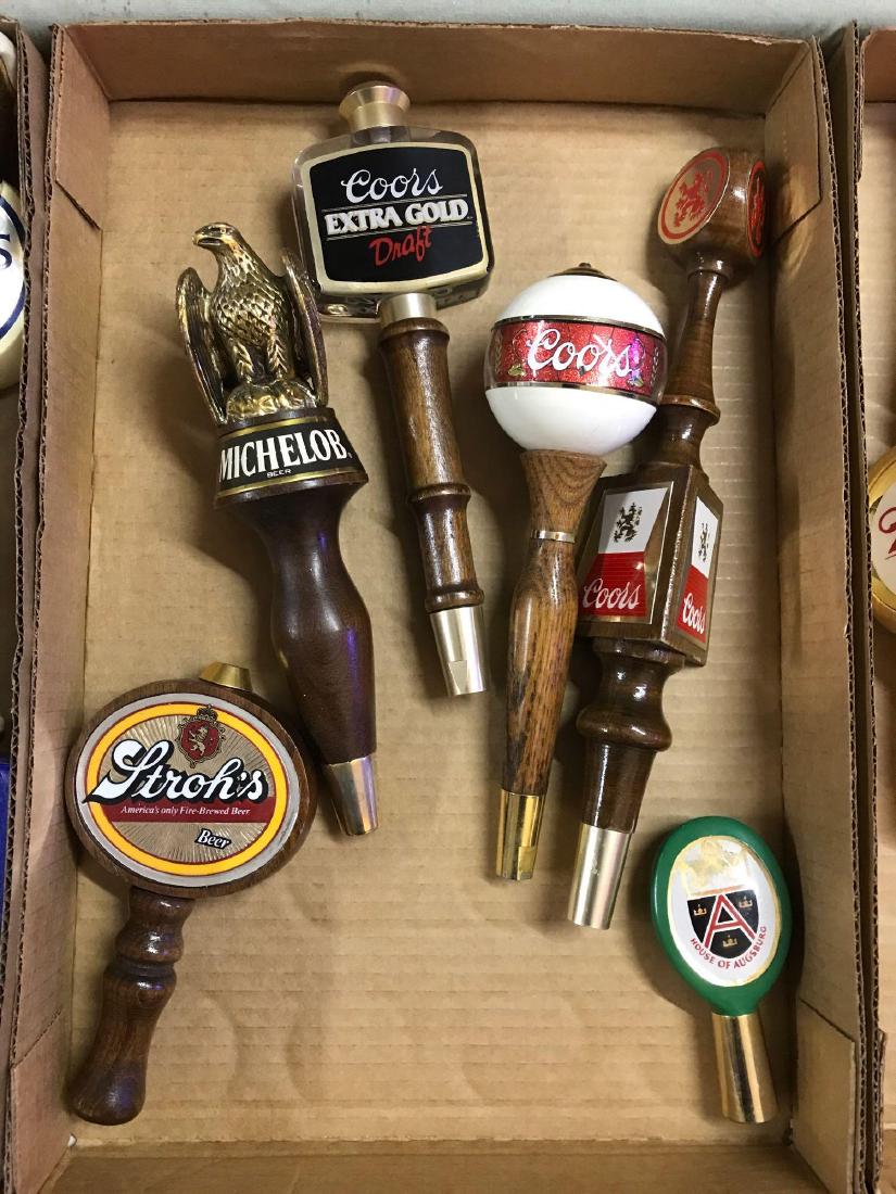 Group of six advertising beer tappers: Featuring Coors, Michelob, and more