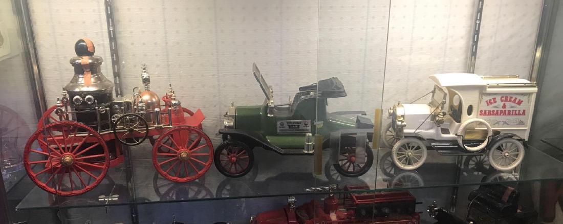 Group of three Jim beam car decanters: very good condition