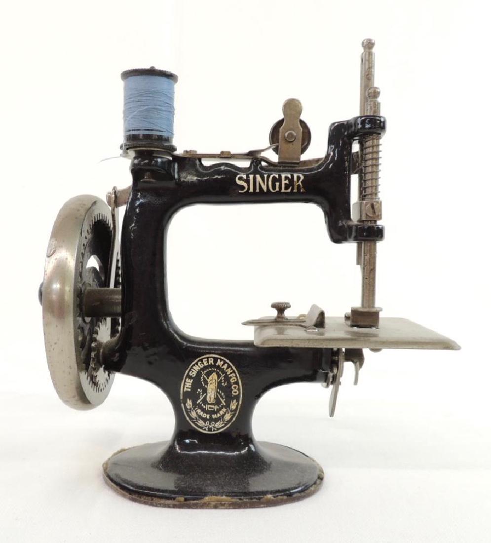 Small Singer Sewing Machine and Book