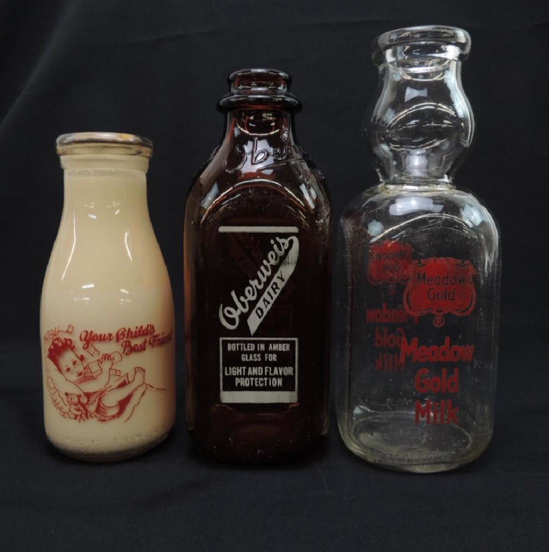 8 Glass Milk Bottles in Pints and Quarts