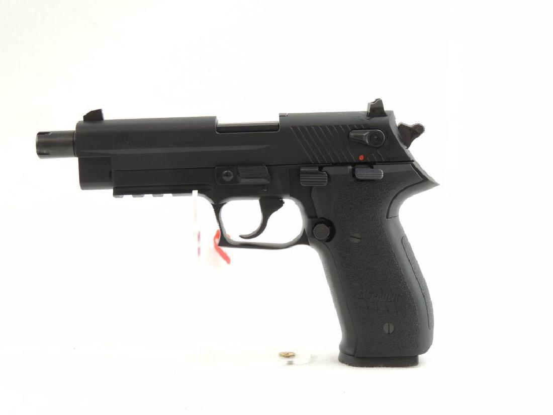 Sig Sauer Mosquito .22 Cal LR Semi-Auto Pistol with: Serial Number F029478, New and Unfired Condition, Featuring Original Case and Magazine