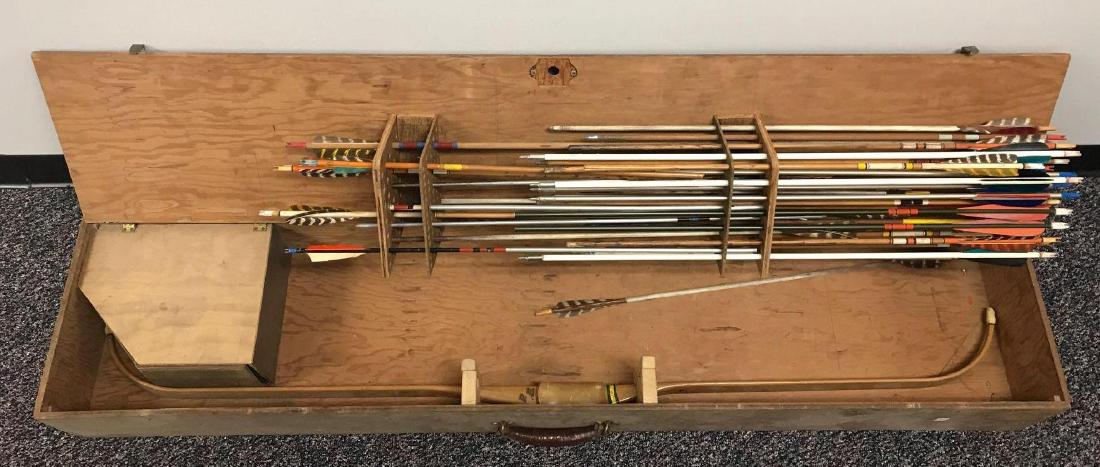 Vintage Paul Bunyan bow with arrows and case: Bow is 56 inches, box by 57" x 12" x 7"