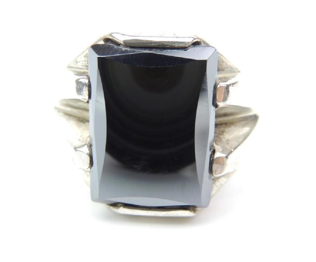 Sterling Silver and Hematite Ring: Sterling silver and hematite ring is a size 11.75 with total weight of 9.6g
