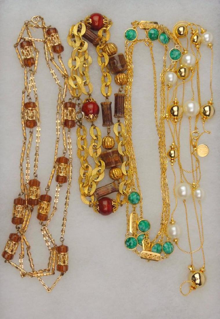 Vintage Beaded Longer Length Necklaces : Trifari and: The Trifari brown necklace is 60", the Anne Klein pearl and gold necklace is 30", the green and gold necklace is 52", and the brown bead necklace is 28"