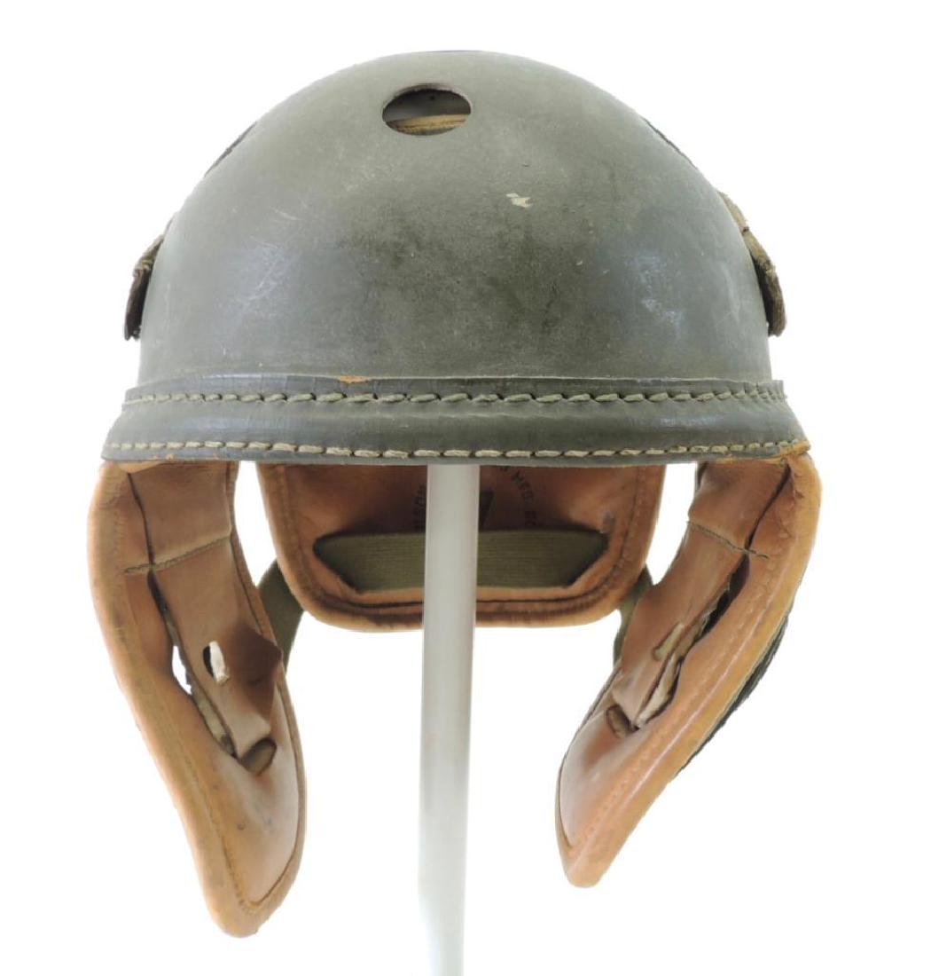 WW2 Wilson U.S. M4A2 Light Tank Helmet with Tag: This helmet in near pristine condition. Only light wear to the leather straps and age wear this helmet apears unused and unissued. A difficult helmet to find in any condition this one would be hard to