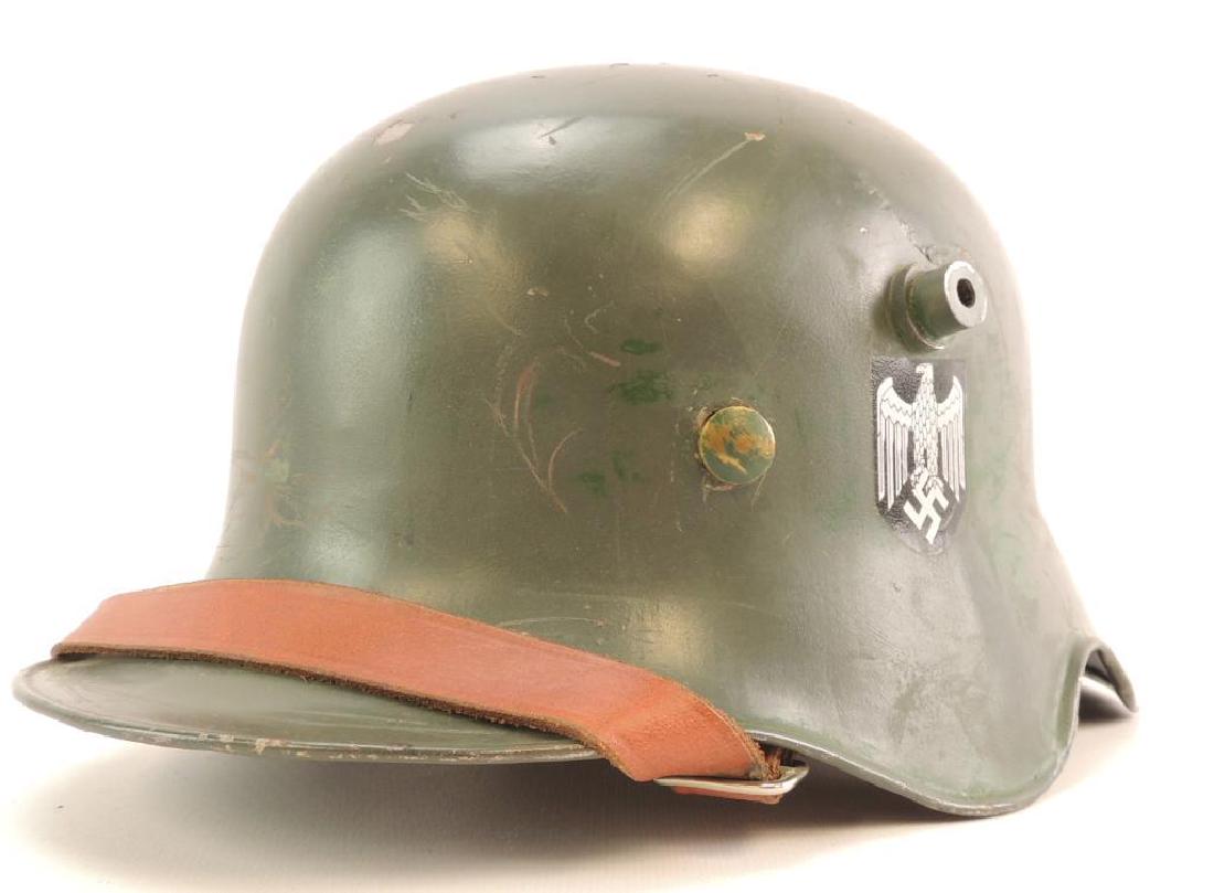 WW2 German Transition Helmet with Double Sided Decals: Leather Strap and Liner appears to have post war decals.