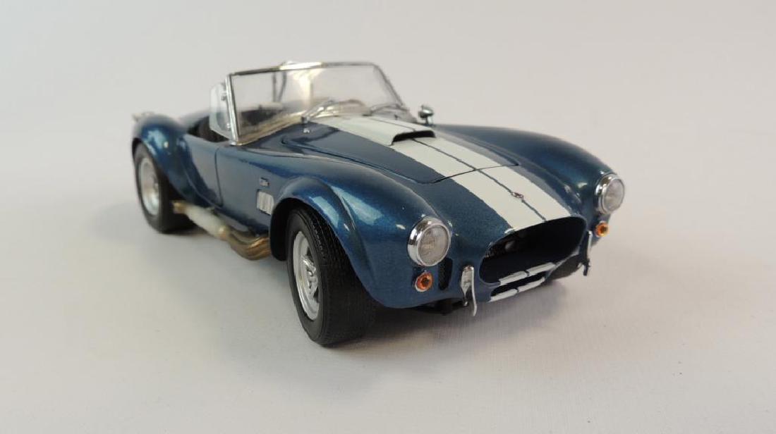 Group Of 3 Die-Cast Cars Featuring Shelby Cobra And (1 of 13)