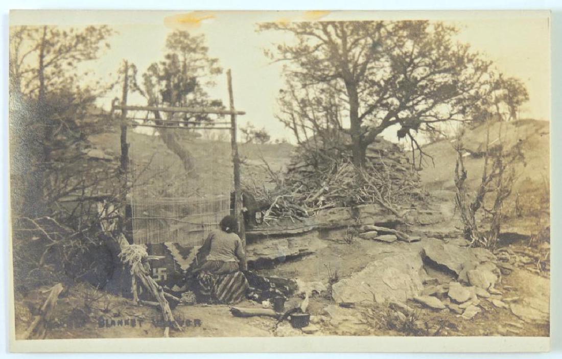 Real Photo Postcard - Navajo Indian Blanket Weaver: Native American Indian titled " The Blanket Weaver" shows blanket in mid weave with a swastika. Arthur back postally unused and in very good condition.