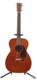 Vintage 1940 Martin Model 00-17 Acoustic Guitar with: Serial Number 78949. Well used with scuffs and scratches throughout; heavy scratches by pickguard, replaced tuners.
