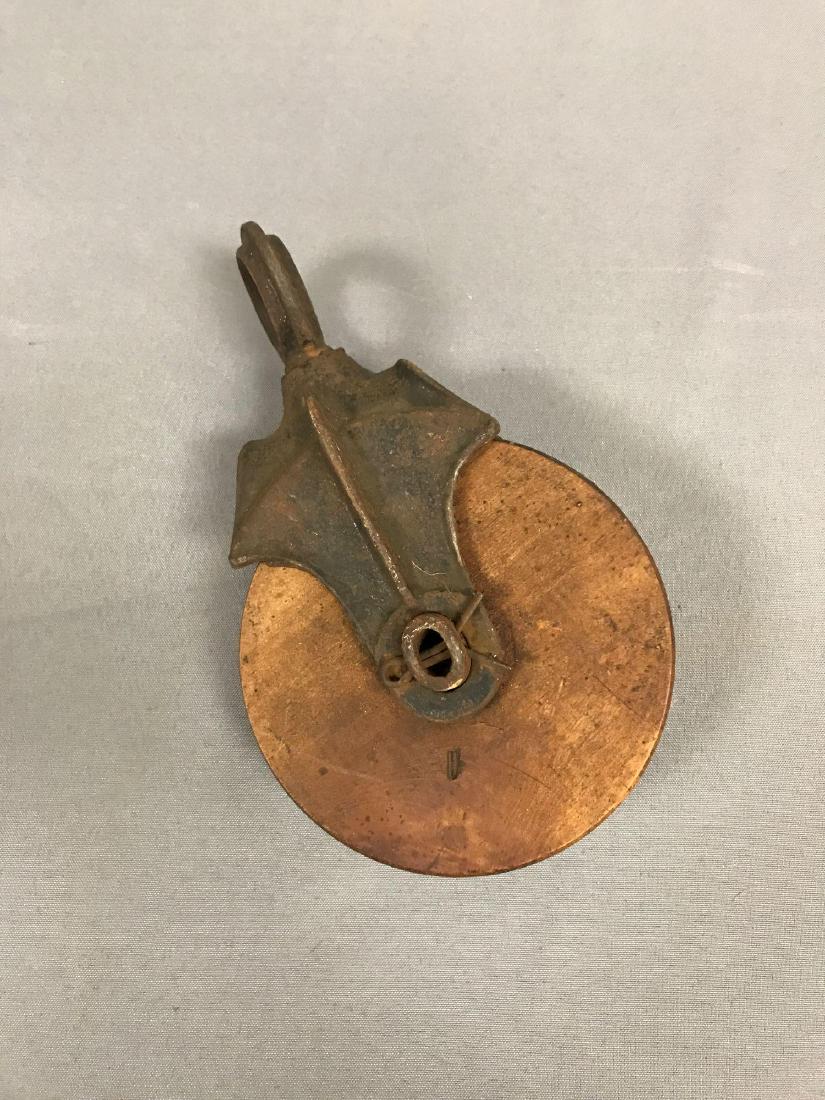Antique Wooden Pulley: 10 inches long w/ a 5 3/4 inch diameter wheel