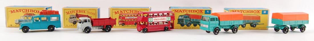 Group of 5 Matchbox Die-Cast Vehicles with Original: Includes No. 12 Safari Land Rover, No. 3 Bedford Tipper Truck, No. 5 London Bus, No. 1 Mercedes Truck, No. 2 Mercedes Trailer. Regular Wheels