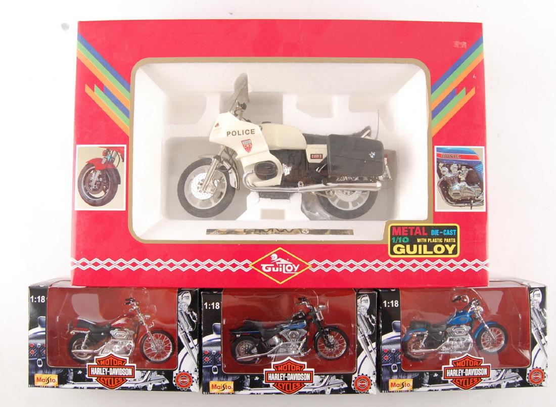 Group of 4 Maisto and Guiloy Motorcycles in Original: MIB, Includes Harley Davidson and Police Bike.