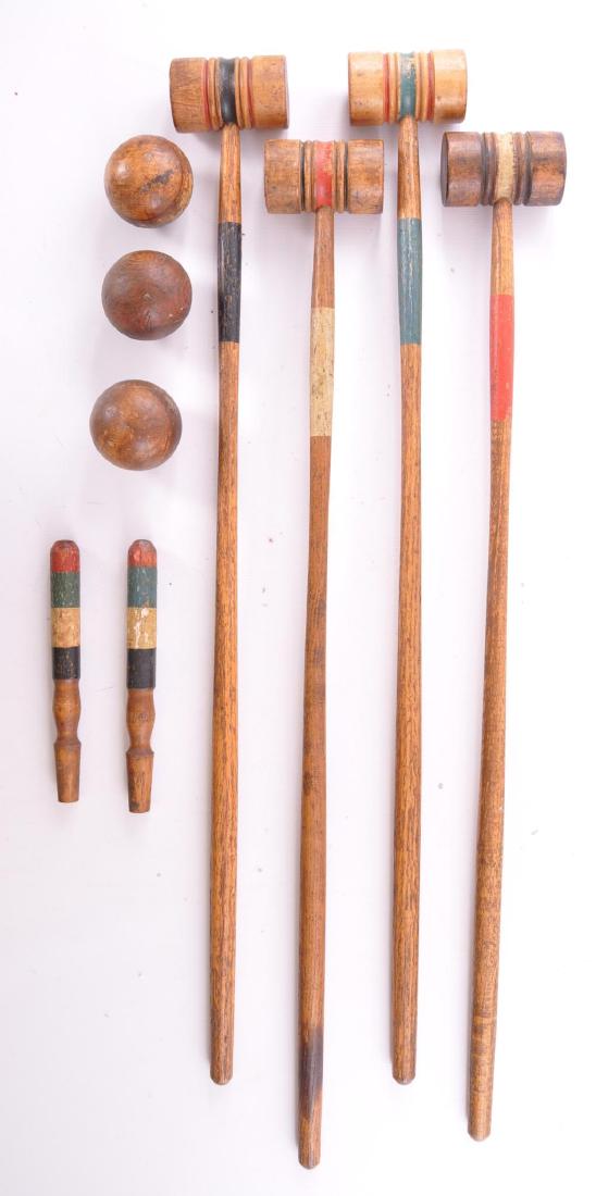 Antique Primitive Croquet Set: 4 Mallets, 3 Balls, and 2 Stakes. Mallets Measure 26 x 3 inches