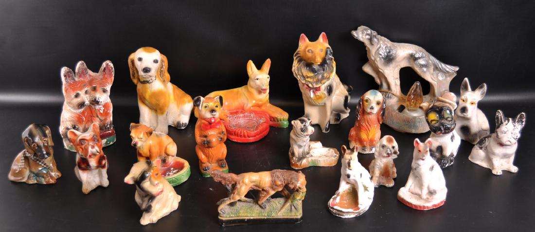 Group of 19 Vintage Carnival Chalk Dog Statues: Includes Ashtrays, TV Lamp, and Others. Largest 10 x 8 x 7 inches. Chips and Paint Flaking Throughout